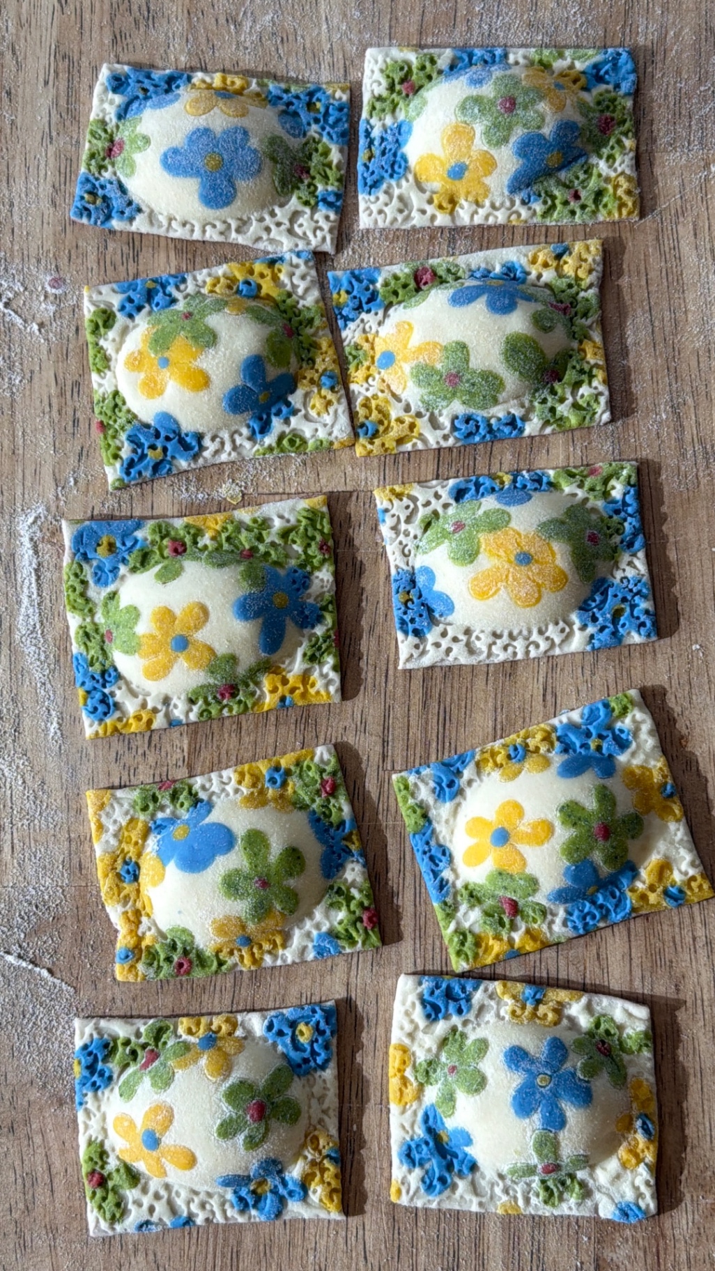 Daisy-framed ravioli squares in blue and yellow