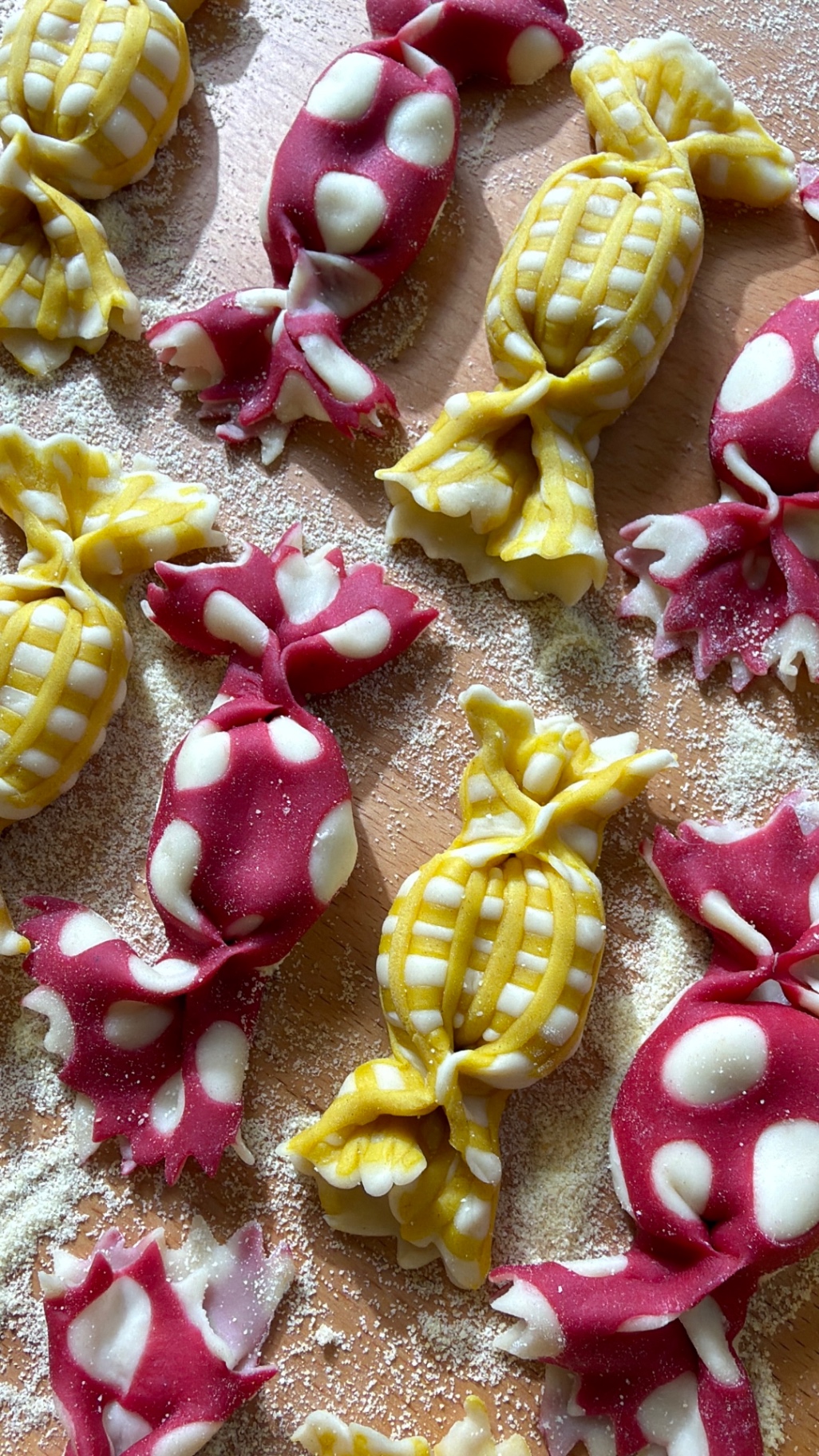 Colorful handmade caramelle pasta