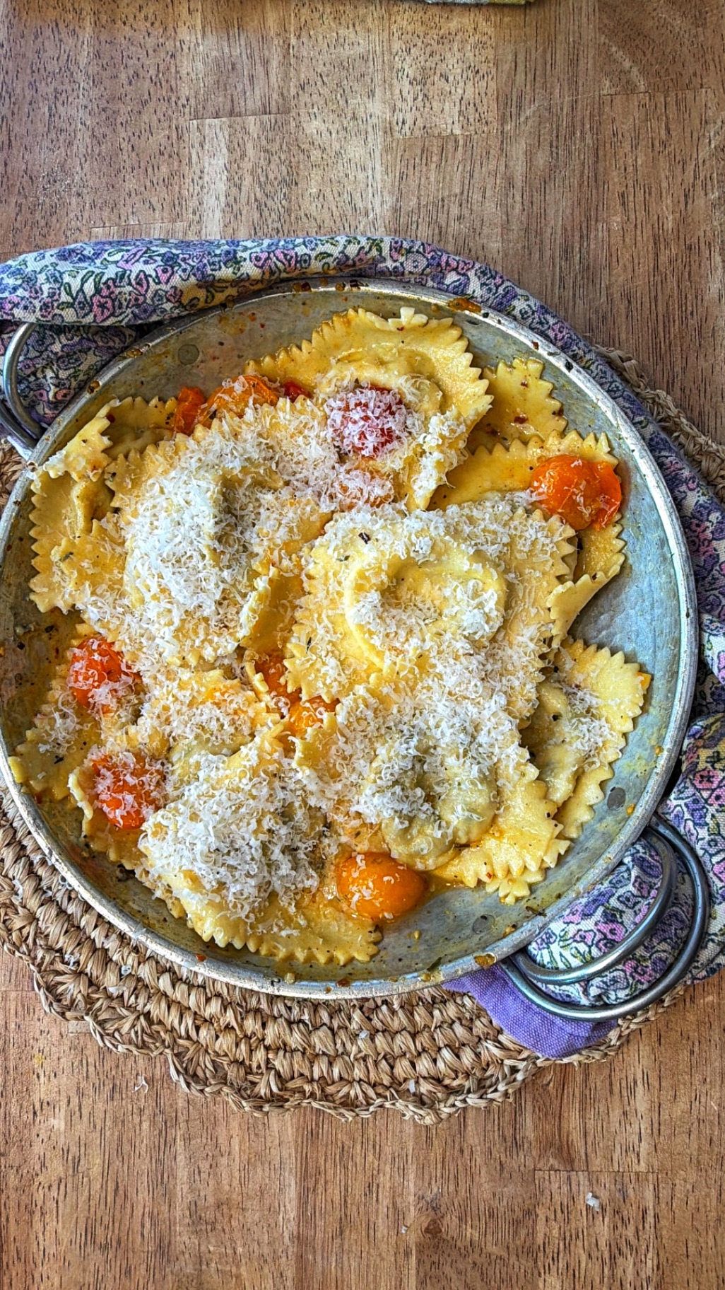 Handmade farfalle pasta with blistered tomatoes