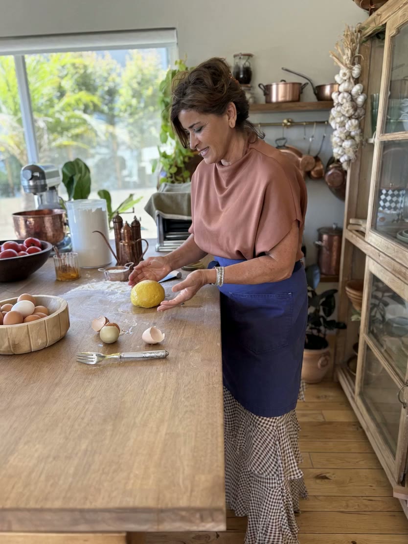 Fiona working with fresh dough in her kitchen